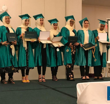 female muslims in graduation ceremony